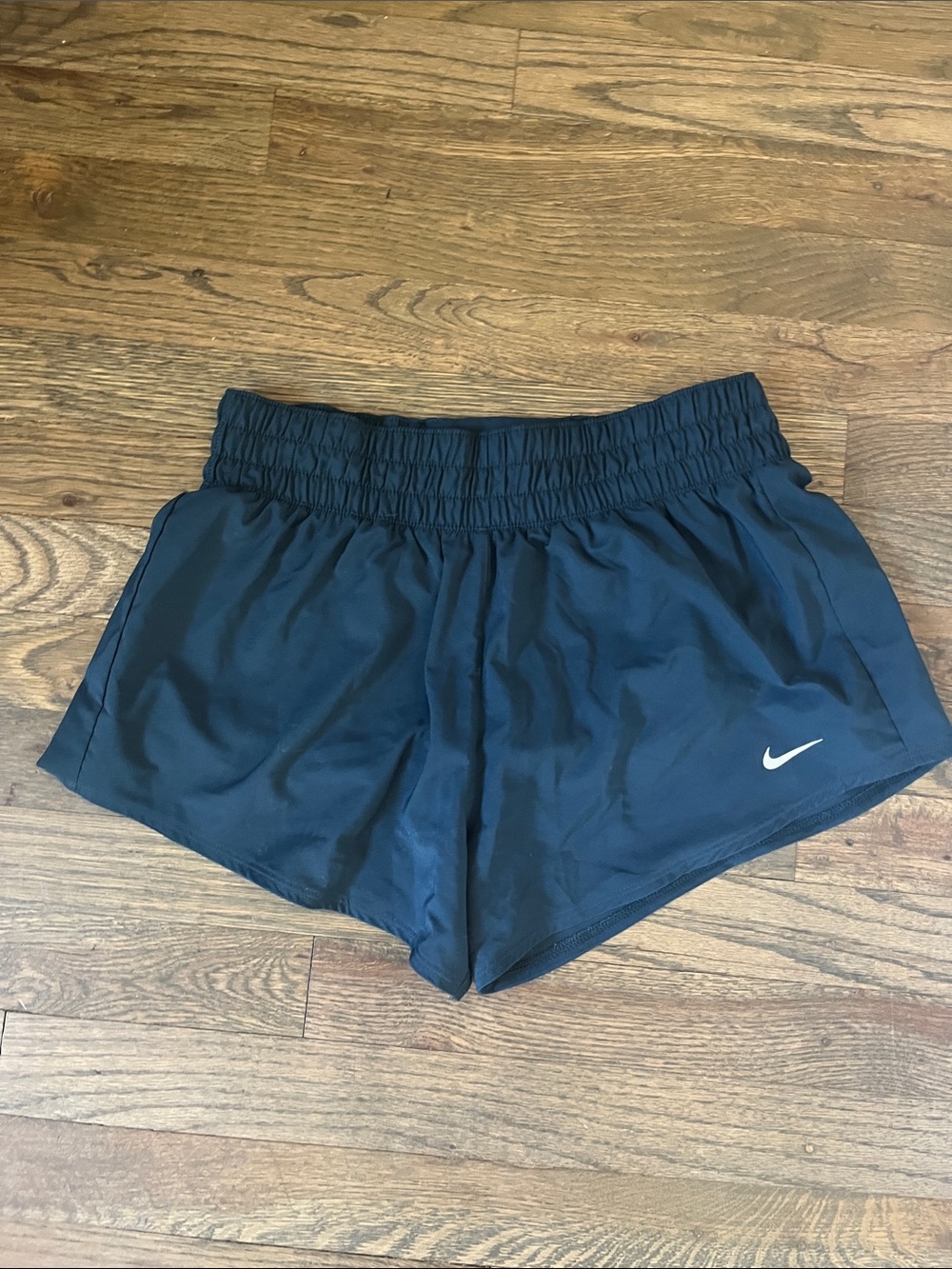 Nike Women's Dark Navy Athletic Shorts with White Swoosh